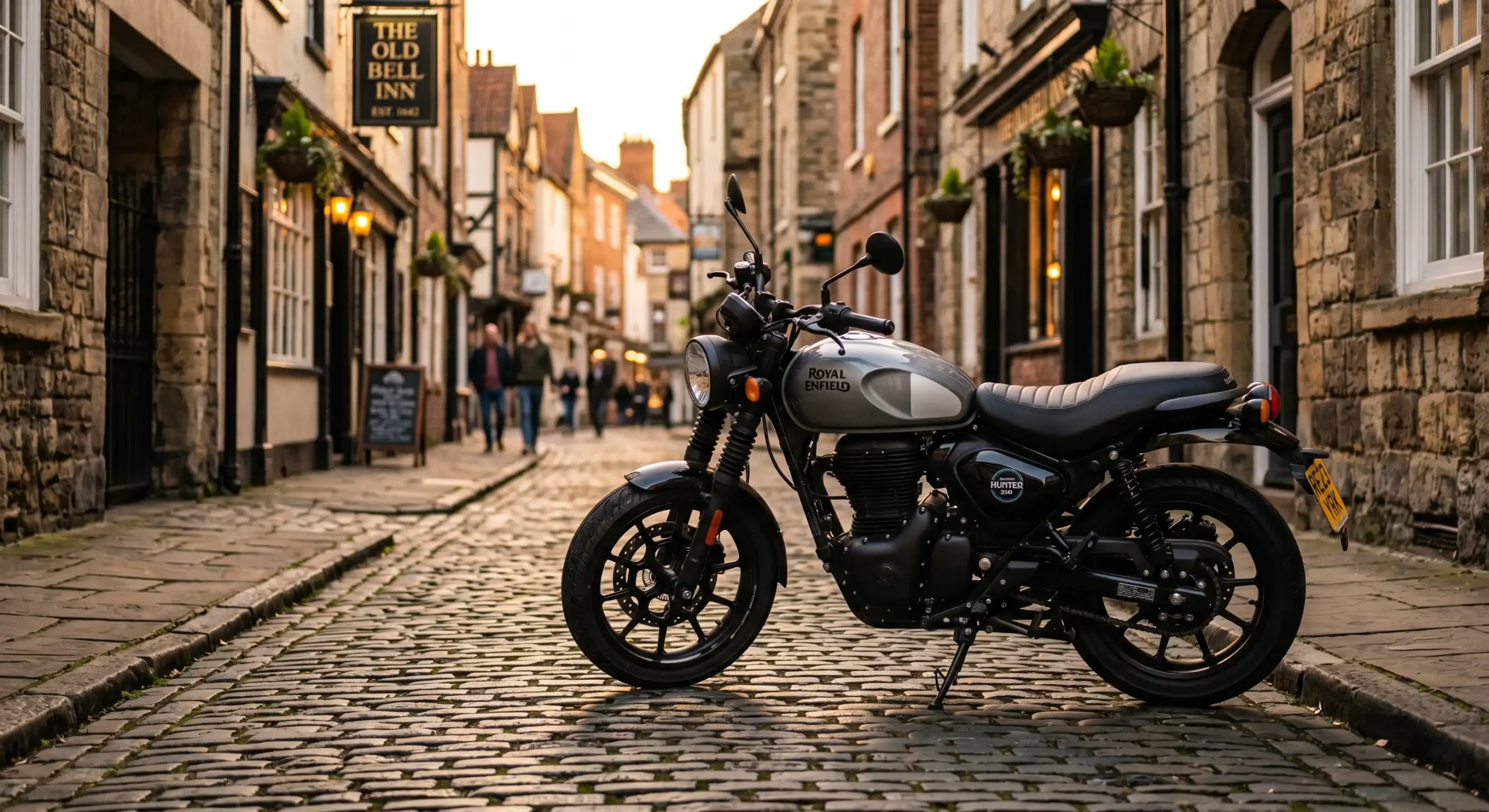 Royal Enfield Hunter 350 parked on a cobbled UK street.